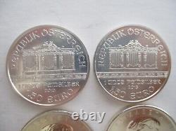 Lot of 4 2013 Fine Silver Coins 2 Maple leaf and 2 Philharmonic BU