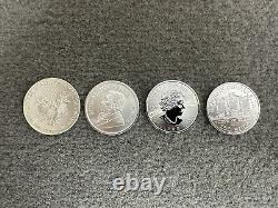 Lot of 4 One Ounce Silver Coins