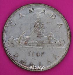 Toned 1947 Blunt 7 Canada Silver Dollar Scarce Semi Key Date. 800 Fine Coin 39